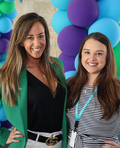 two women celebrating equal workplace rights