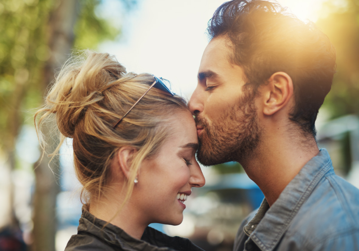 two workers in the healthcare industry embracing